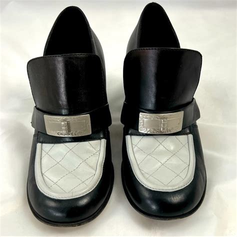 chanel loafers black and white